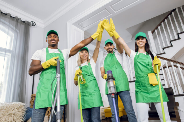 professional-team-of-mixed-race-cleaners-giving-hi-2026-01-11-09-54-45-utc